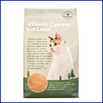 Package of Hinoki Cypress Cat Litter Booster with a cat on the label