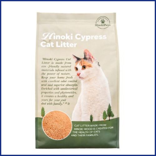 Package of Hinoki Cypress Cat Litter Booster with a cat on the label