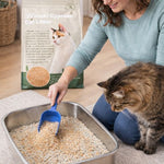 Woman with a cat interacting with a container of Hinoki Cypress cat litter.
