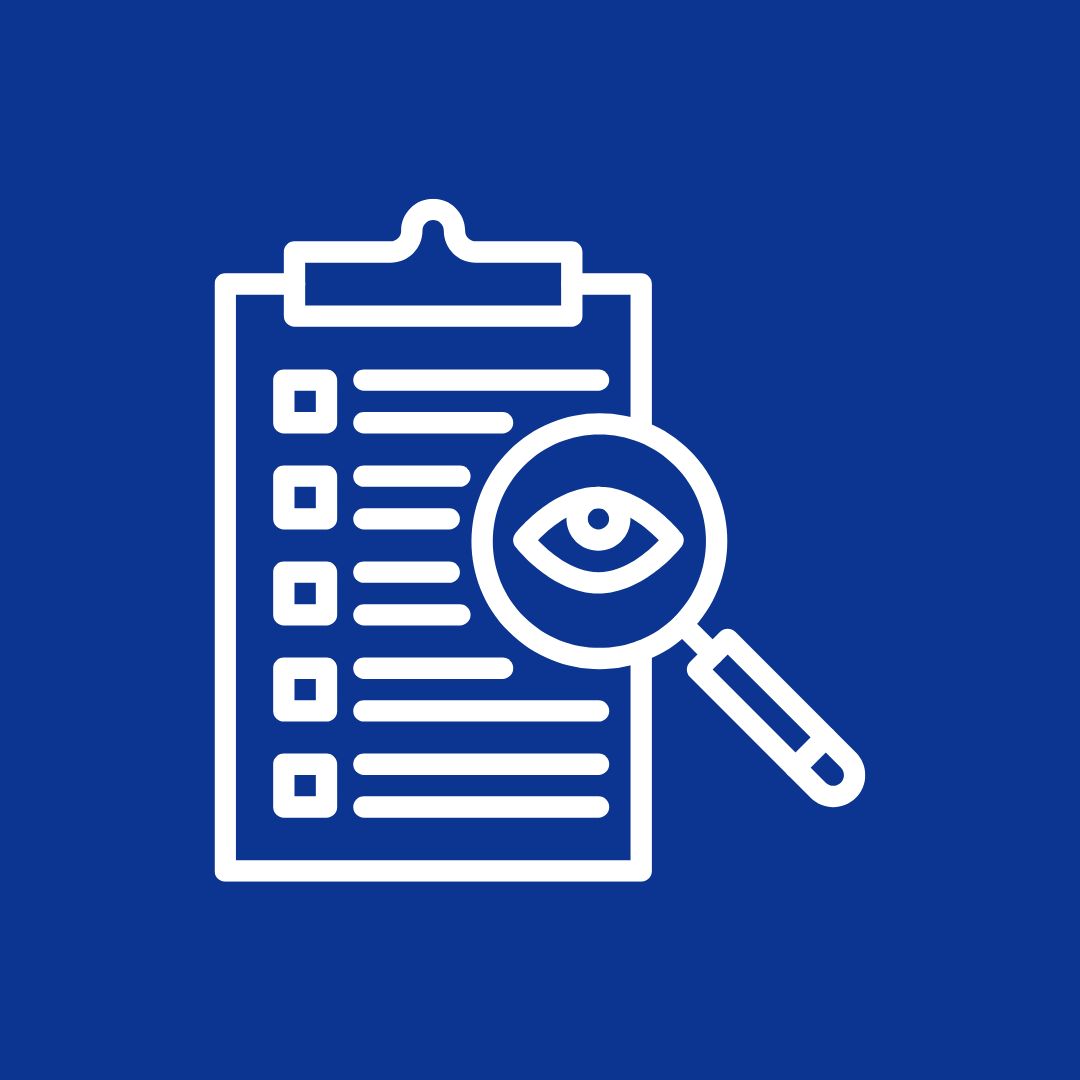 An image of notepad with a checklist and a magnifier.
