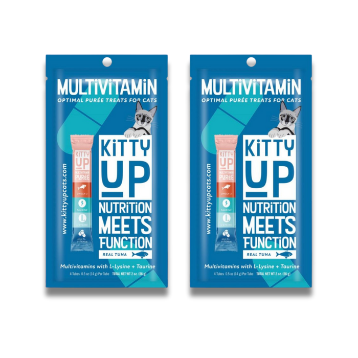 Two blue packages of Kitty Up Multivitamin cat treats shown side by side on a white background. The packaging features a cat illustration and product branding.