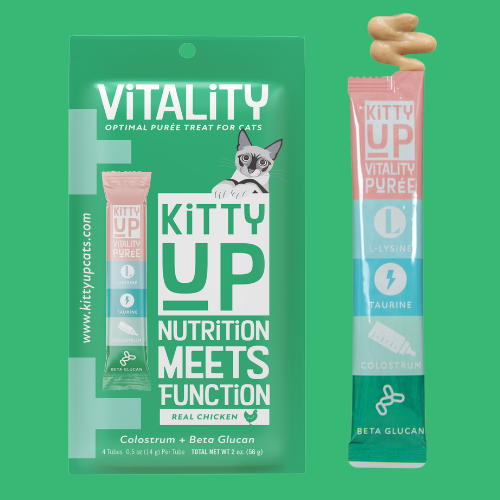 Kitty Up Vitality Optimal Purée treats for cats shown as a pouch and single tube on a green background.