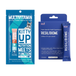 Kitty Up cat health supplement set featuring a blue Multivitamin pouch on the left and a blue Resilibiome probiotic sachet with its retail box on the right, both on a white background.